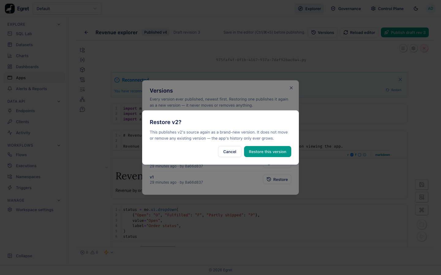 The Restore v2? confirmation over the Versions dialog, with Cancel and Restore this version